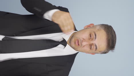Vertical-video-of-Businessman-with-migraine.